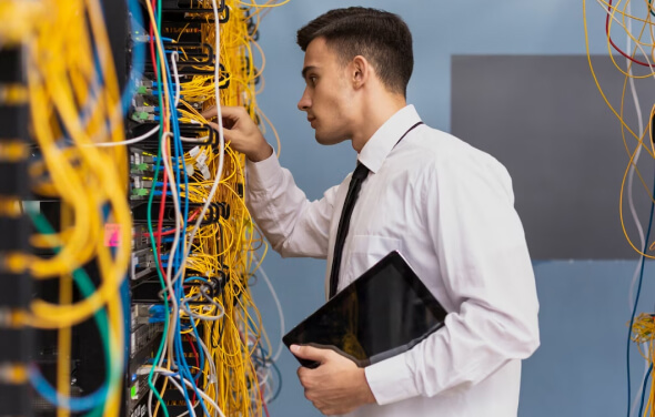A technicia in server room working